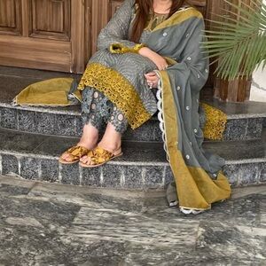 Pakistani boutique style Gray and Mustard suit